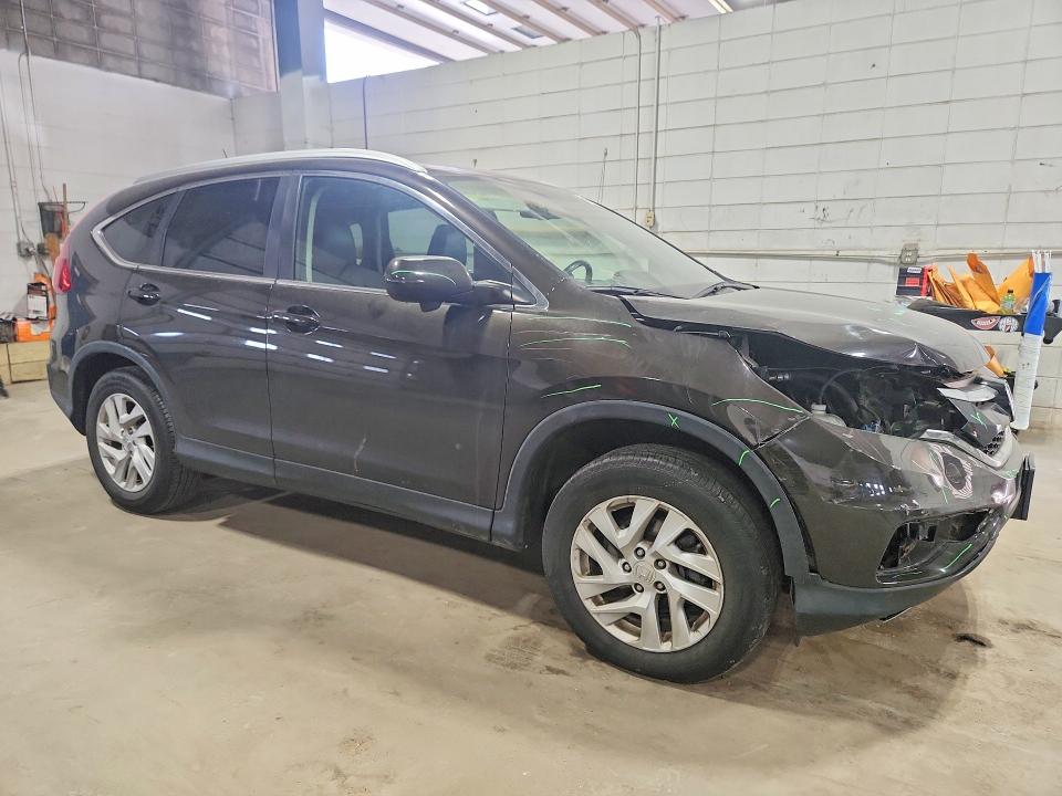 Photo 4 from auction – 2015 HONDA CR-V with VIN 2HKRM4H73FH621619