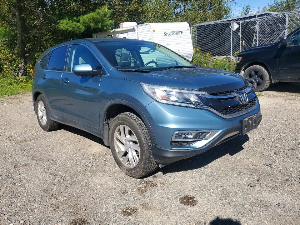 Photo 4 from auction – 2016 HONDA CR-V with VIN 2HKRM4H73GH129383