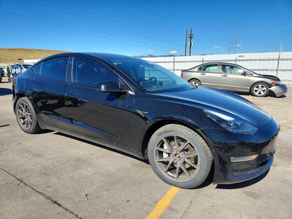 Photo 4 from auction – 2021 TESLA MODEL 3 with VIN 5YJ3E1EB6MF980114