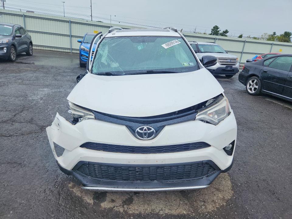 Photo 5 from auction – 2016 TOYOTA RAV4 with VIN 2T3JFREV8GW414144