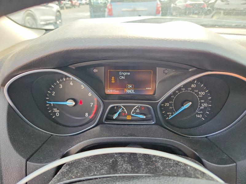 Photo 9 from auction – 2015 FORD FOCUS with VIN 1FADP3E27FL342793