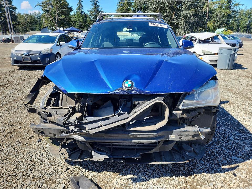 Photo 5 from auction – 2014 BMW X1 with VIN WBAVL1C5XEVY15498