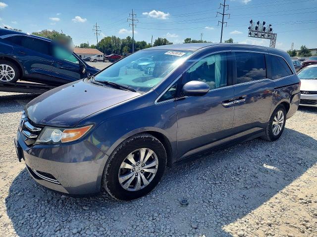Снимка 1 от търг – 2016 HONDA ODYSSEY с VIN 5FNRL5H38GB129044