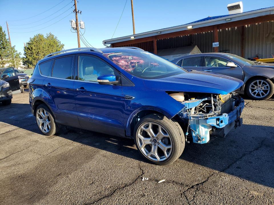 Photo 4 from auction – 2018 FORD ESCAPE with VIN 1FMCU0J95JUD55685