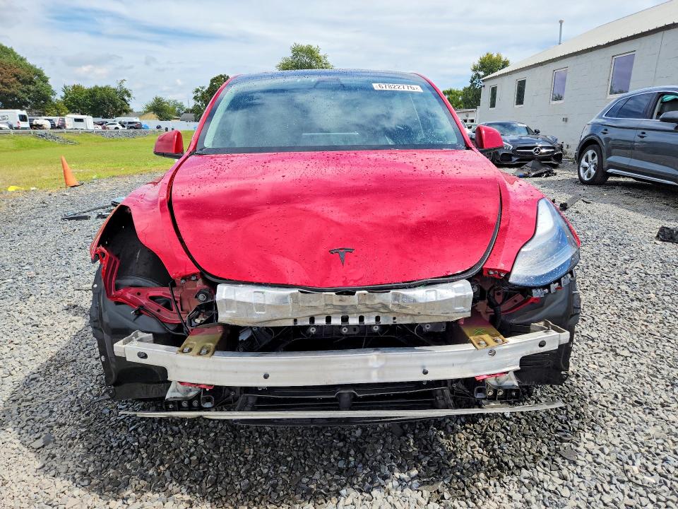 Снимка 5 от търг – 2022 TESLA MODEL Y с VIN 7SAYGDEF0NF466865