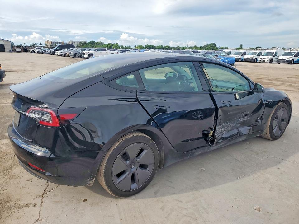 Photo 3 from auction – 2023 TESLA MODEL 3 with VIN 5YJ3E1EAXPF453673