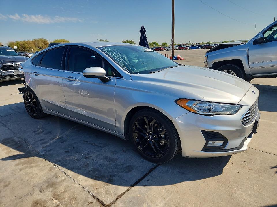 Снимка 4 от търг – 2019 FORD FUSION с VIN 3FA6P0HD3KR169872
