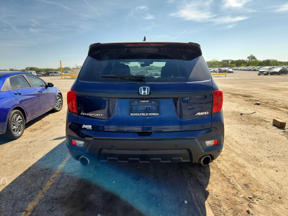 Photo 6 from auction – 2023 HONDA PASSPORT with VIN 5FNYF8H5XPB030652
