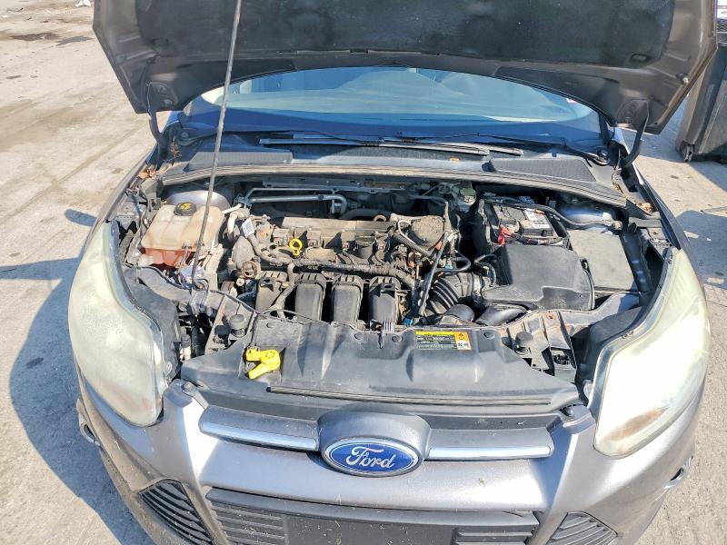 Photo 11 from auction – 2013 FORD FOCUS with VIN 1FADP3E23DL370989