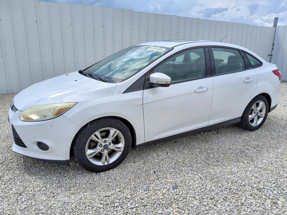 FORD FOCUS 2014 with VIN 1FADP3F22EL345890 - Photo from auction