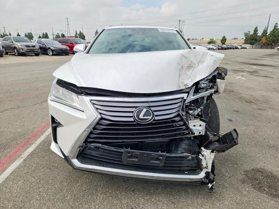 Фото 5 с аукциона – 2019 LEXUS RX с VIN JTJGZKCA0K2011671