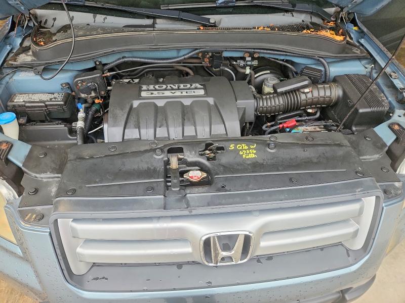 Снимка 12 от търг – 2006 HONDA PILOT с VIN 5FNYF18456B018079