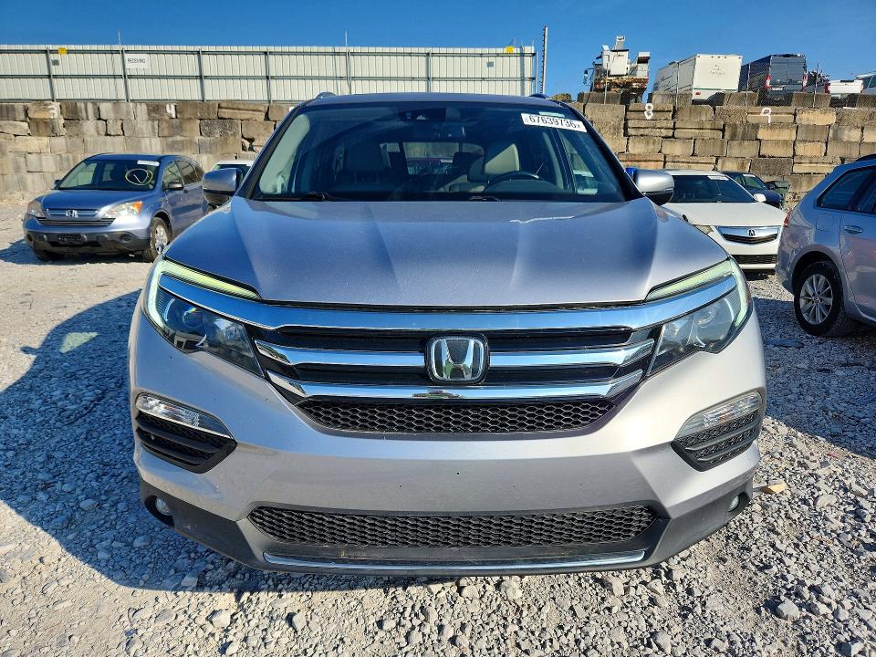 Фото 5 с аукциона – 2016 HONDA PILOT с VIN 5FNYF6H03GB122968