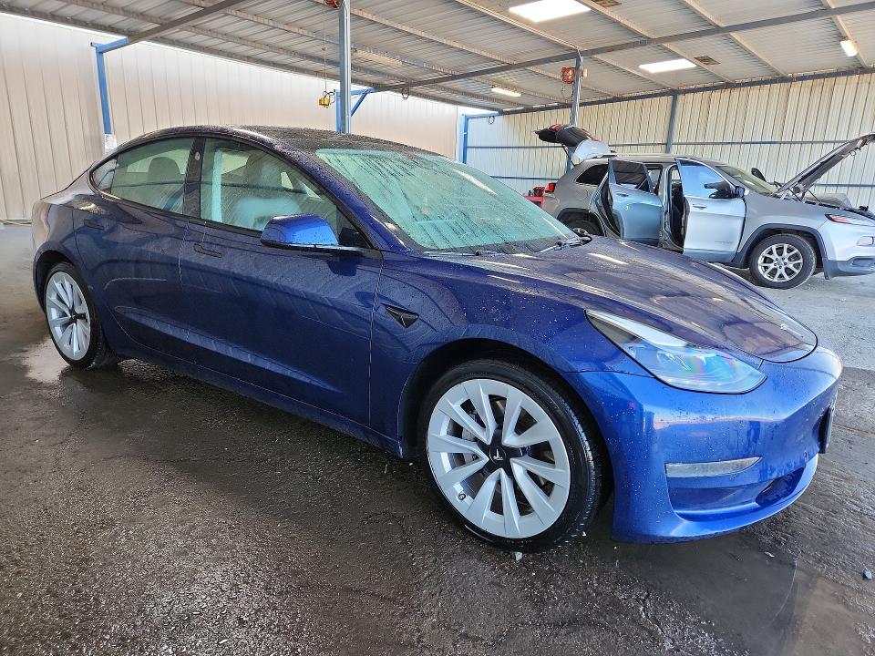 Снимка 4 от търг – 2022 TESLA MODEL 3 с VIN 5YJ3E1EA6NF370139