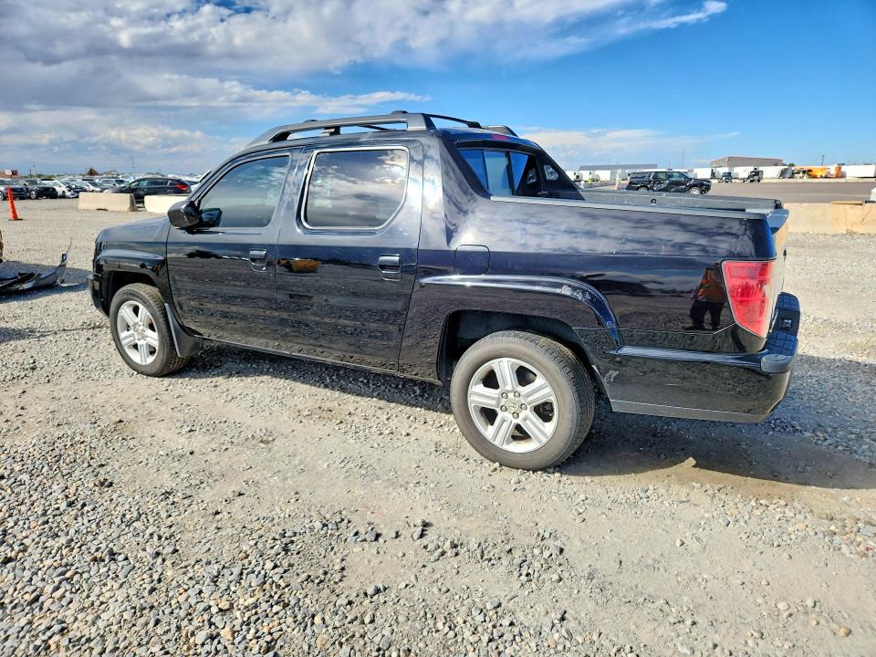 Photo 2 from auction – 2010 HONDA RIDGELINE with VIN 5FPYK1F50AB008454