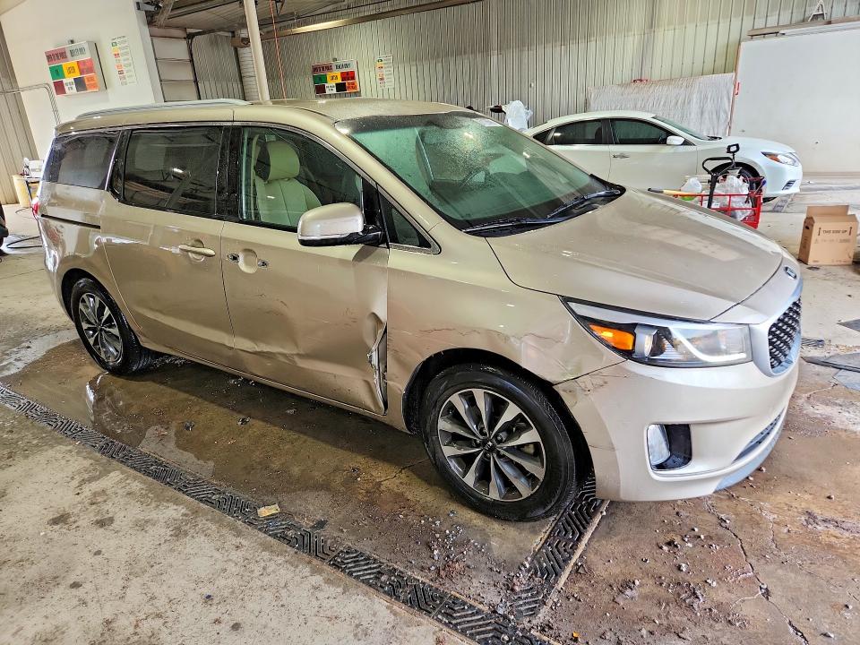 Photo 4 from auction – 2015 KIA SEDONA with VIN KNDMC5C18F6019640