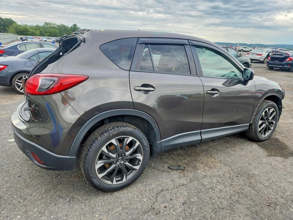 Снимка 3 от търг – 2016 MAZDA CX-5 с VIN JM3KE4DY0G0876196