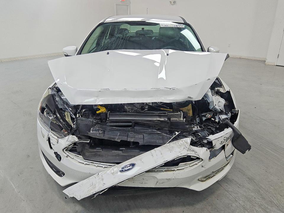 Zdjęcie 5 z aukcji – 2016 FORD FOCUS z VIN 1FADP3FE6GL215625