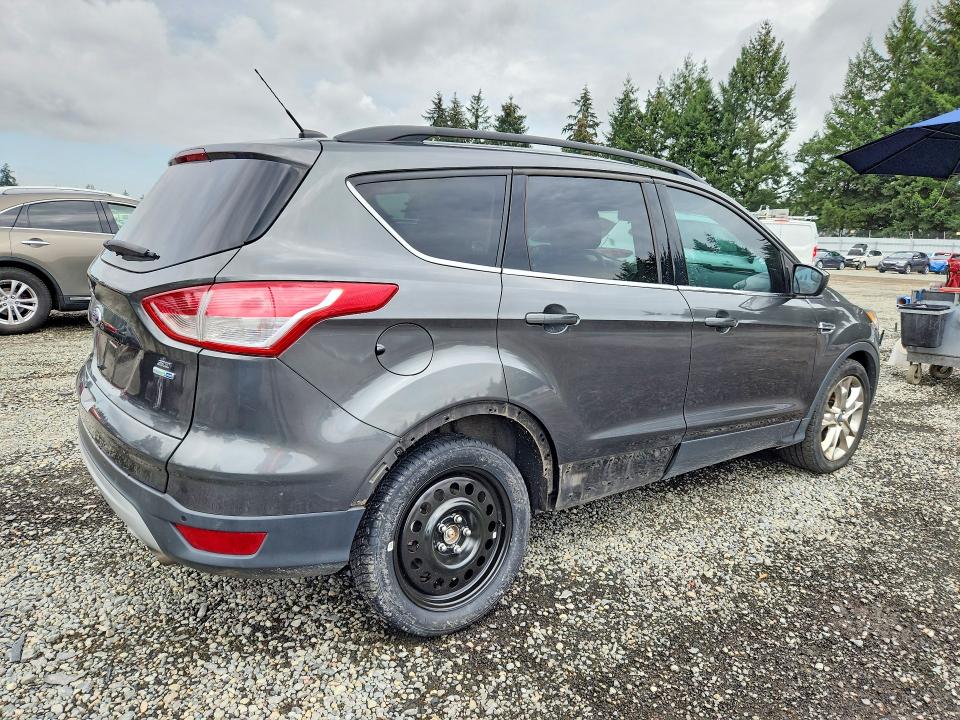 Photo 3 from auction – 2015 FORD ESCAPE with VIN 1FMCU9GX8FUB32073