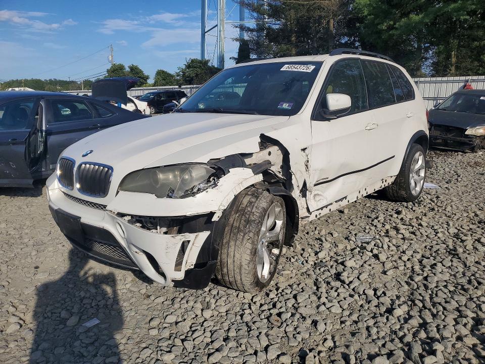 BMW X5 2011 with VIN 5UXZV4C58BL403554 - Photo from auction