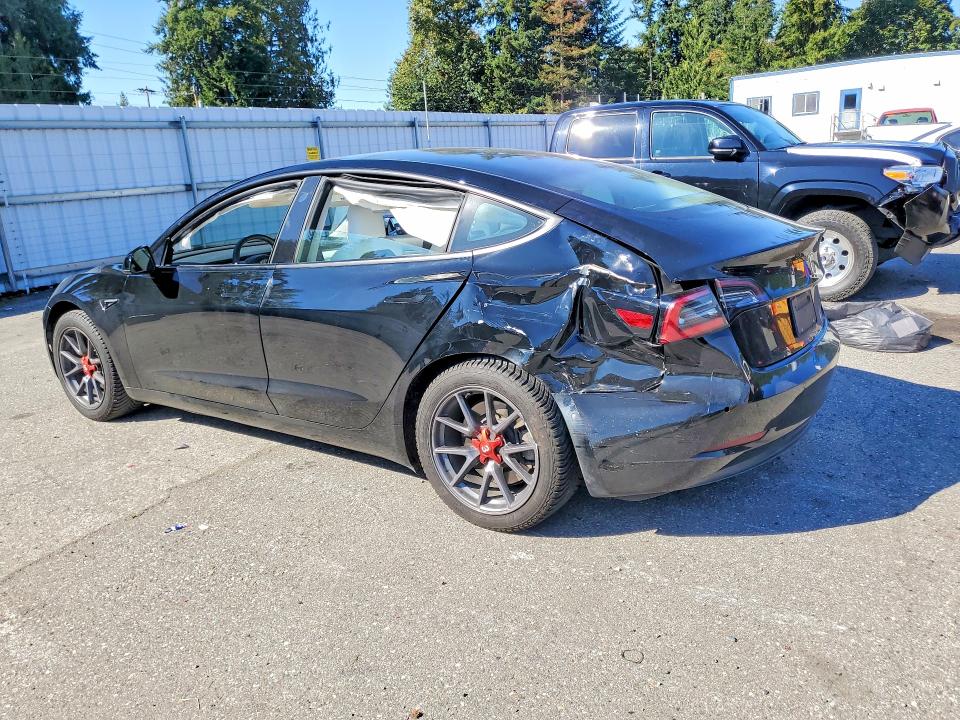 Фото 2 с аукциона – 2021 TESLA MODEL 3 с VIN 5YJ3E1EB1MF924940
