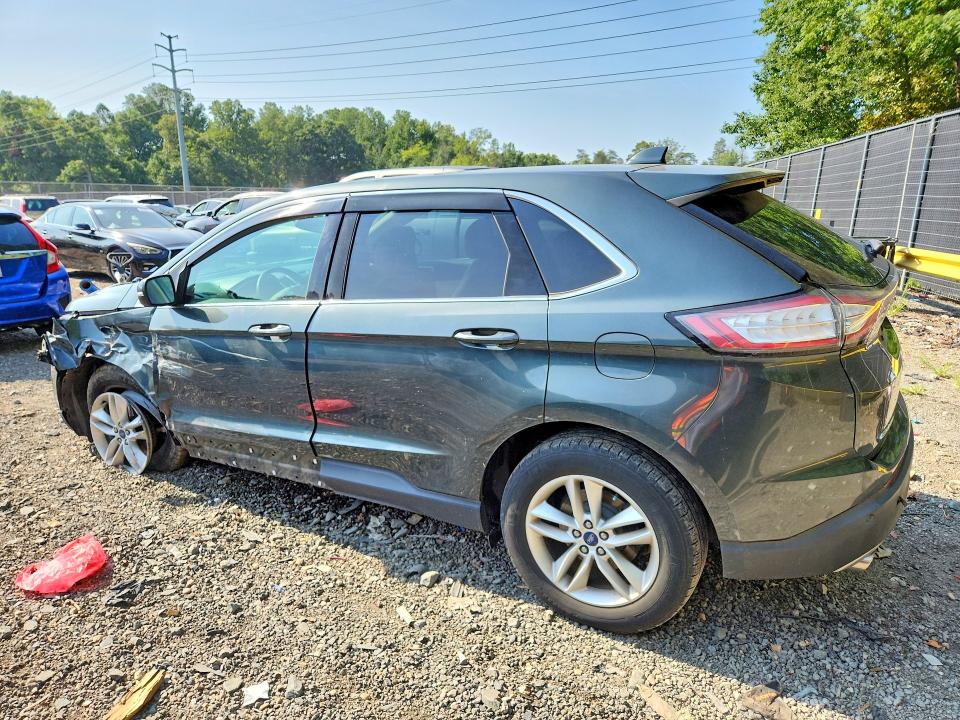 Photo 2 from auction – 2015 FORD EDGE with VIN 2FMTK3J84FBB19833