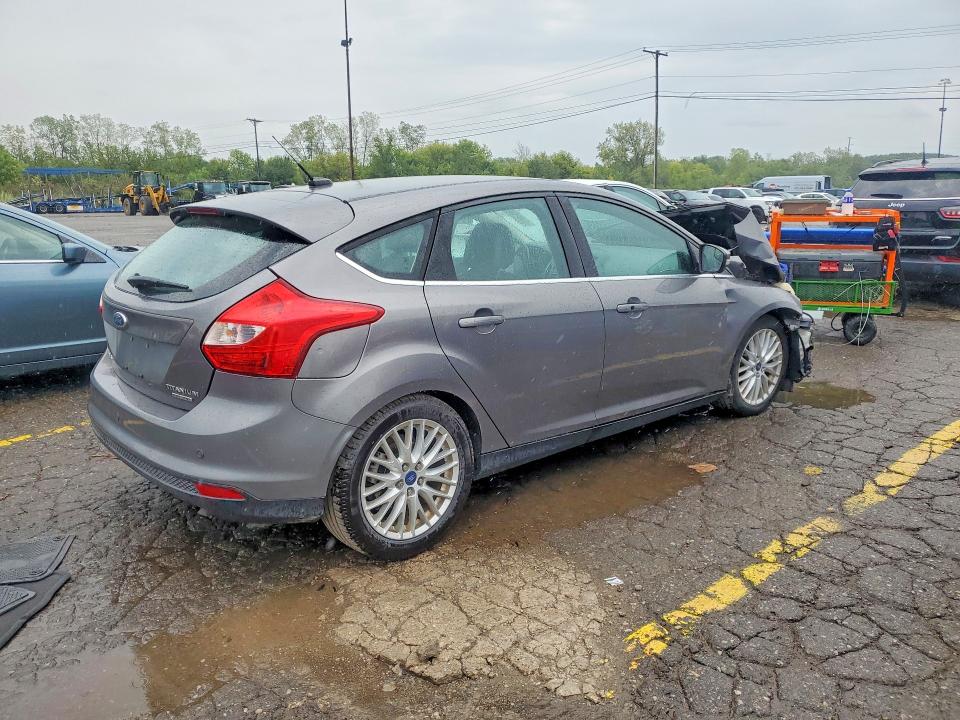 Photo 3 from auction – 2014 FORD FOCUS with VIN 1FADP3N25EL270099