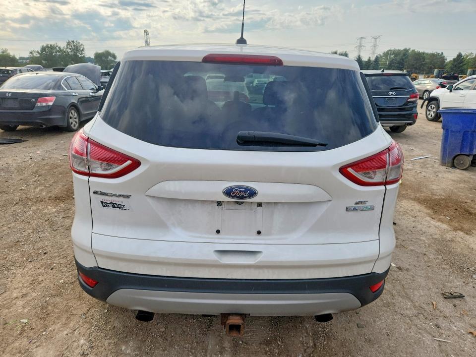 Photo 6 from auction – 2016 FORD ESCAPE with VIN 1FMCU0G9XGUC75315
