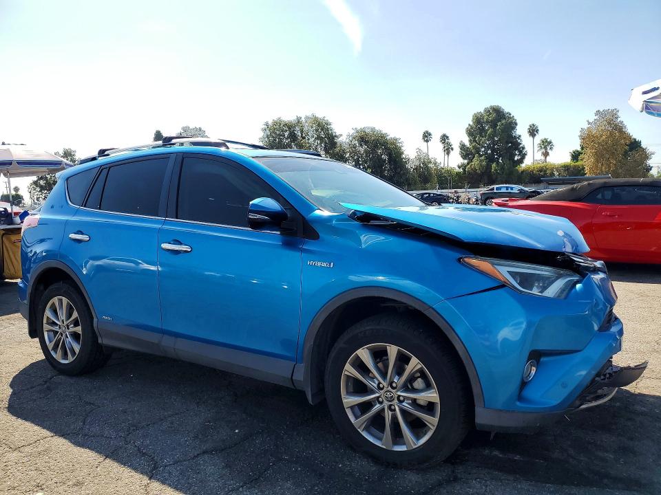 Photo 4 from auction – 2018 TOYOTA RAV4 HV with VIN JTMDJREV1JD159577