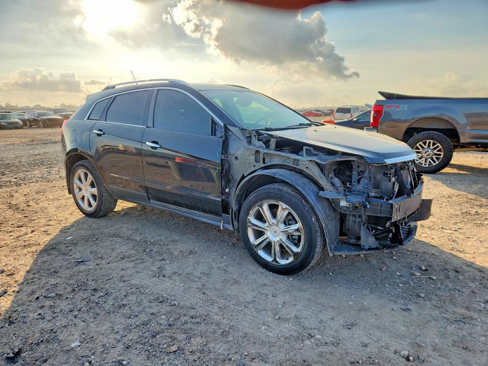 Photo 4 from auction – 2014 CADILLAC SRX with VIN 3GYFNCE39ES562585
