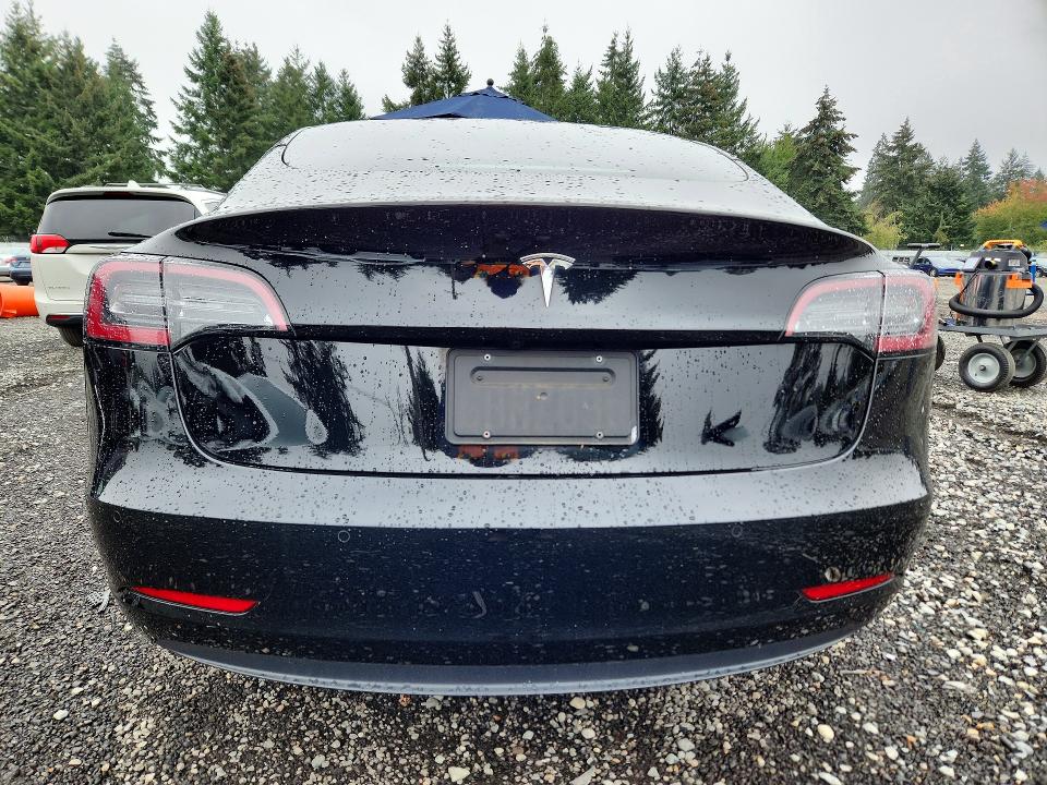 Снимка 6 от търг – 2022 TESLA MODEL 3 с VIN 5YJ3E1EA8NF167298