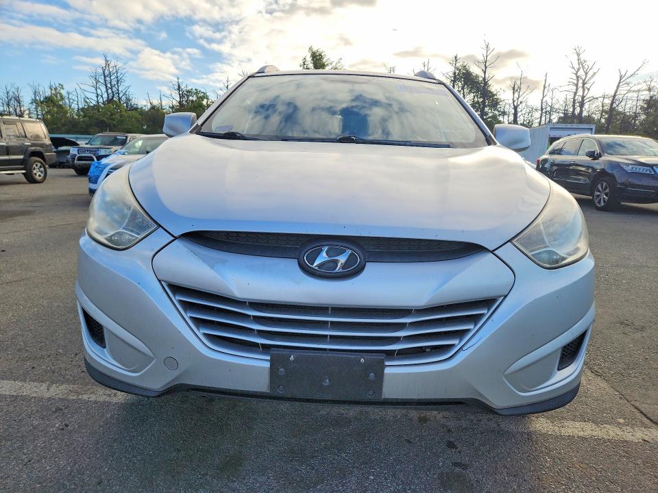 Photo 5 from auction – 2011 HYUNDAI TUCSON with VIN KM8JU3AC1BU198131