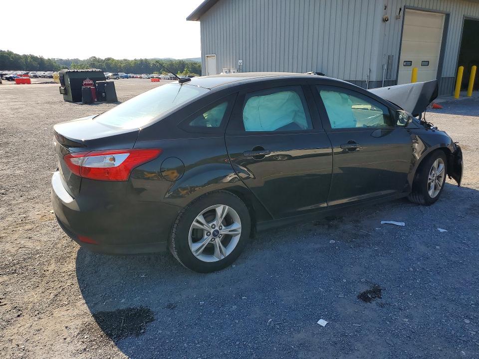 Снимка 3 от търг – 2014 FORD FOCUS с VIN 1FADP3F21EL425133