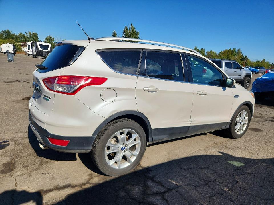 Foto 3 de la subasta – 2014 FORD ESCAPE con VIN 1FMCU0JX5EUC52531