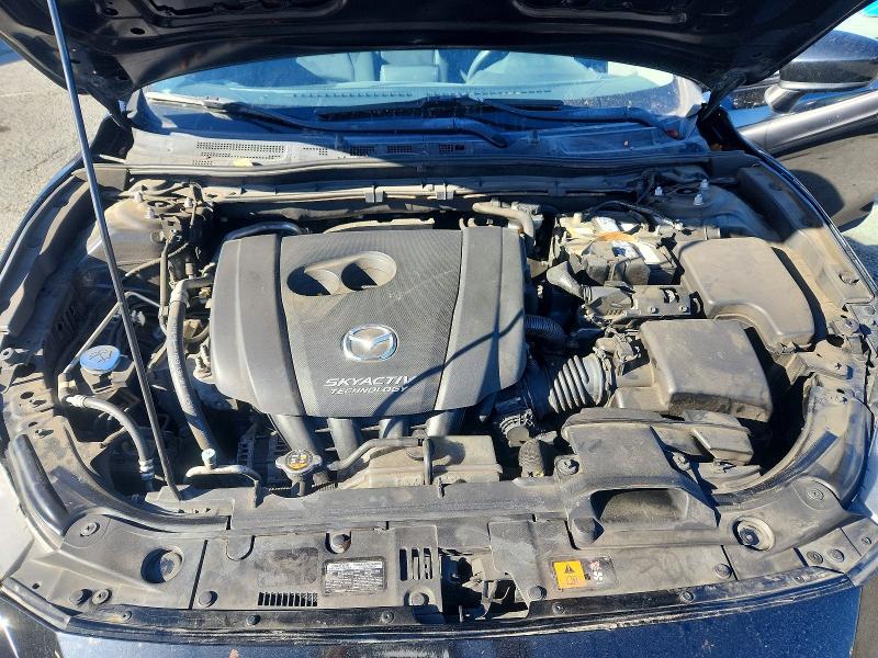 Снимка 11 от търг – 2014 MAZDA 3 с VIN JM1BM1U77E1214639