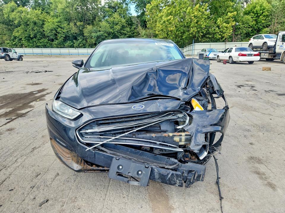 Photo 5 from auction – 2016 FORD FUSION with VIN 3FA6P0H79GR277219