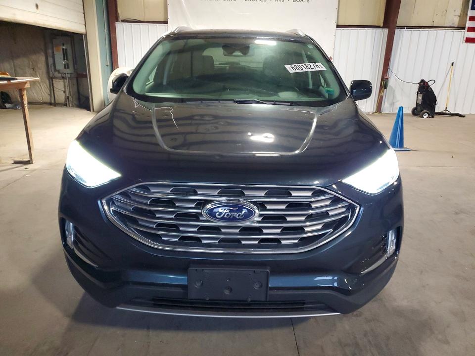 Foto 5 de la subasta – 2022 FORD EDGE con VIN 2FMPK4J95NBA25183