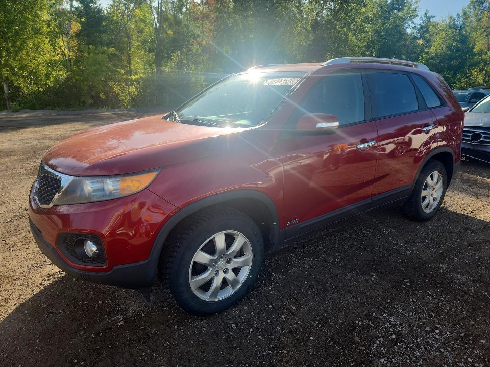 KIA SORENTO 2011 with VIN 5XYKTCA10BG023218 - Photo from auction