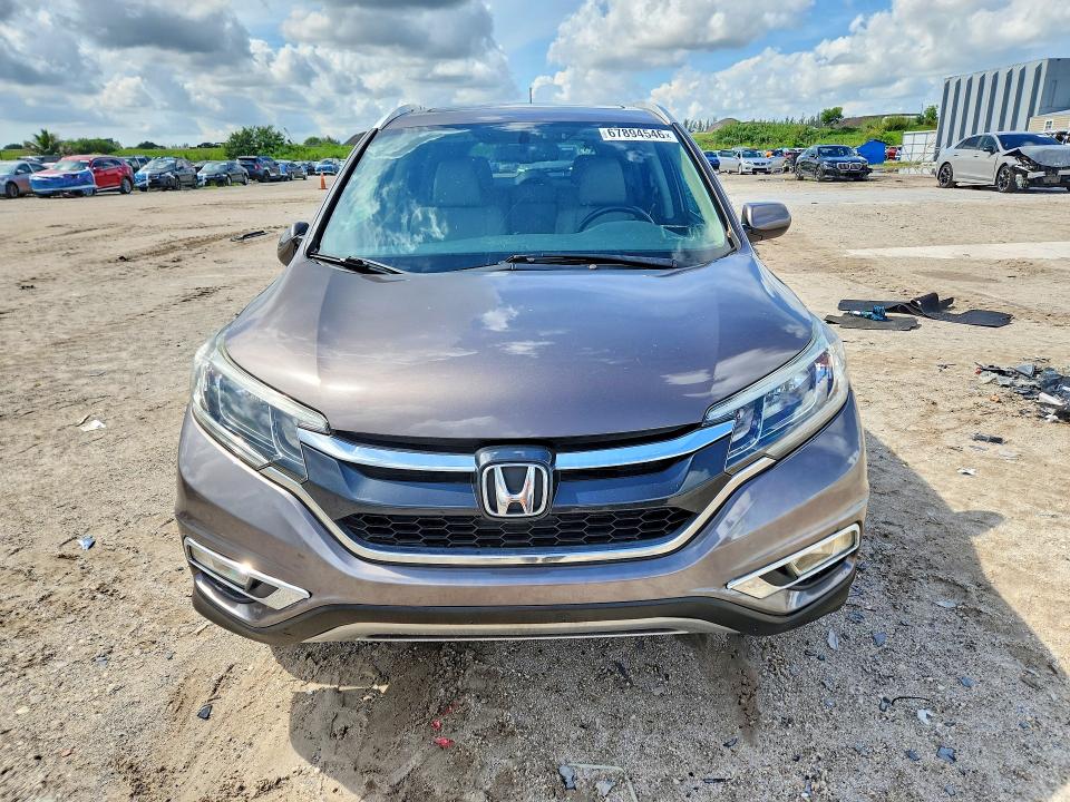 Photo 5 from auction – 2016 HONDA CR-V with VIN 2HKRM4H70GH682296