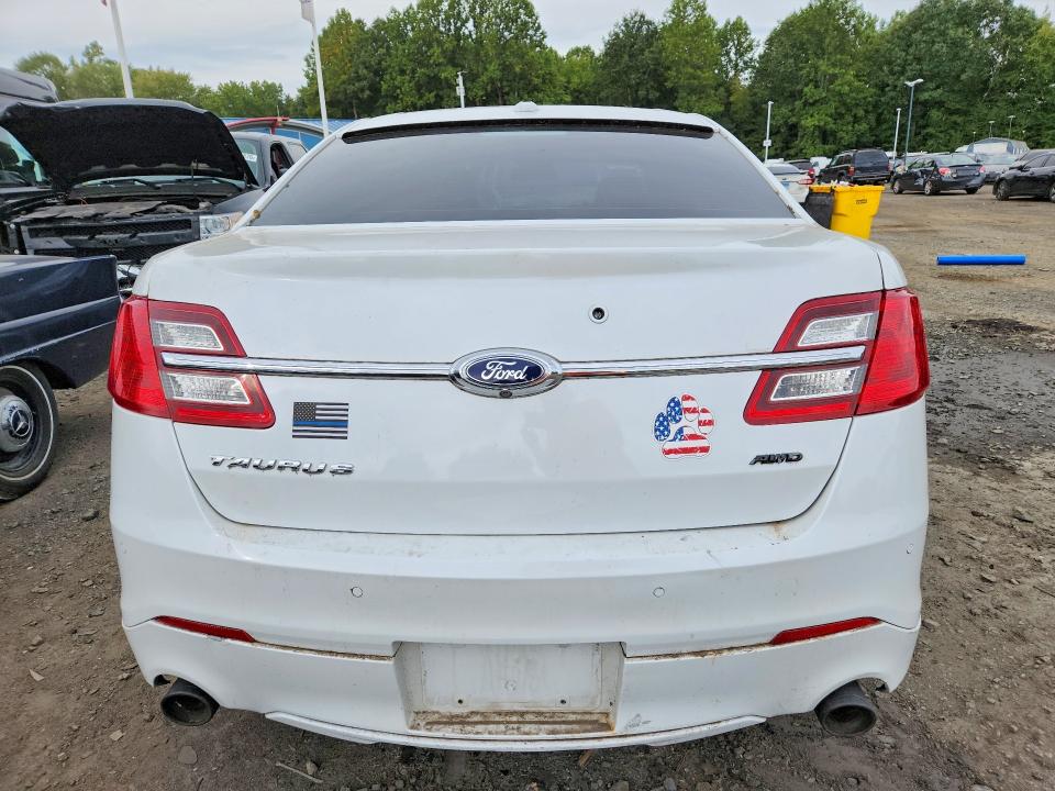 Photo 6 from auction – 2015 FORD TAURUS with VIN 1FAHP2MKXFG157305