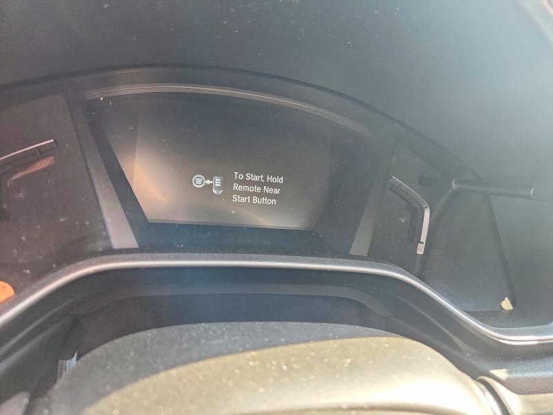 Photo 9 from auction – 2018 HONDA CR-V with VIN 7FARW1H58JE040636