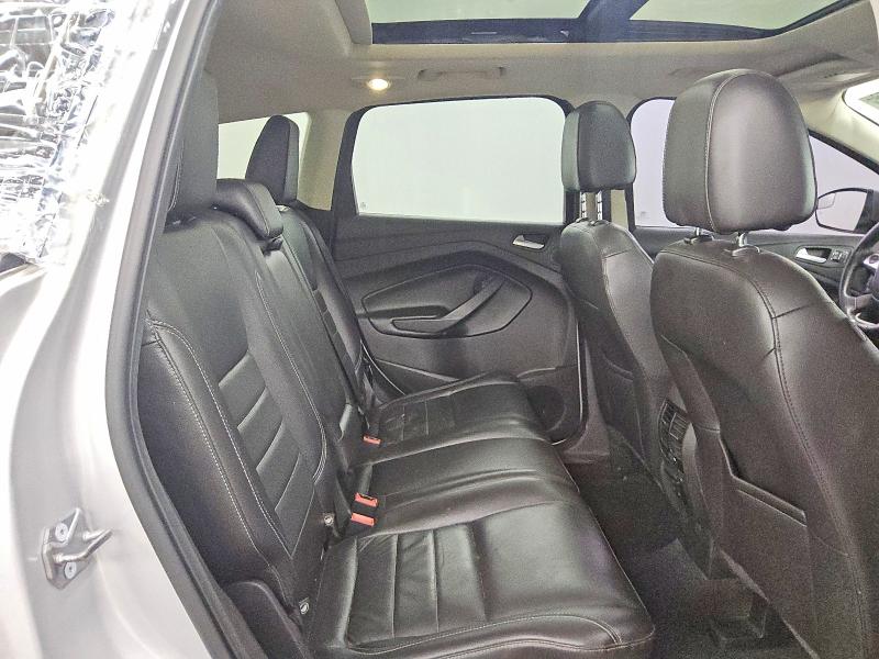 Снимка 10 от търг – 2016 FORD ESCAPE с VIN 1FMCU9JX3GUC21978
