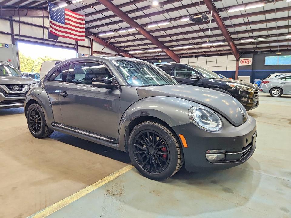 Photo 4 from auction – 2013 VOLKSWAGEN BEETLE with VIN 3VWV67AT6DM643359