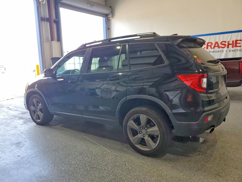 Photo 2 from auction – 2019 HONDA PASSPORT with VIN 5FNYF8H90KB026296