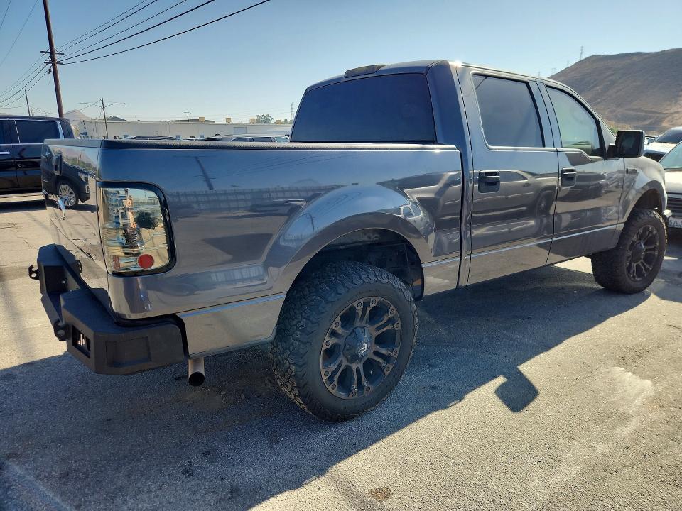Photo 3 from auction – 2006 FORD F150 with VIN 1FTPW14566KC02878