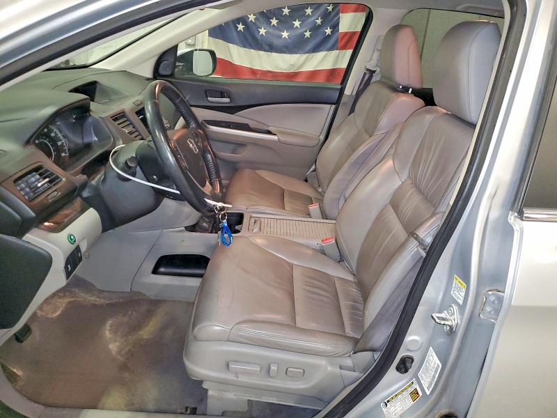 Photo 7 from auction – 2014 HONDA CR-V with VIN 2HKRM4H79EH701117