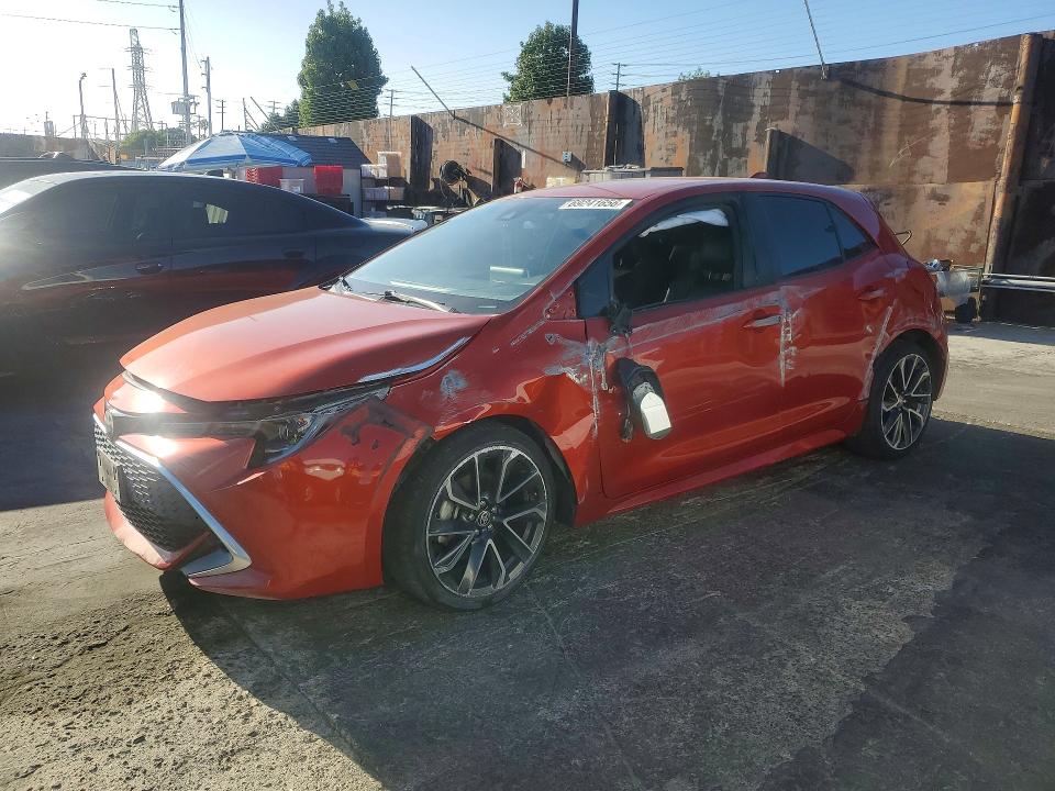 TOYOTA COROLLA HATCHBACK 2019 with VIN JTNK4RBE3K3051581 - Photo from auction