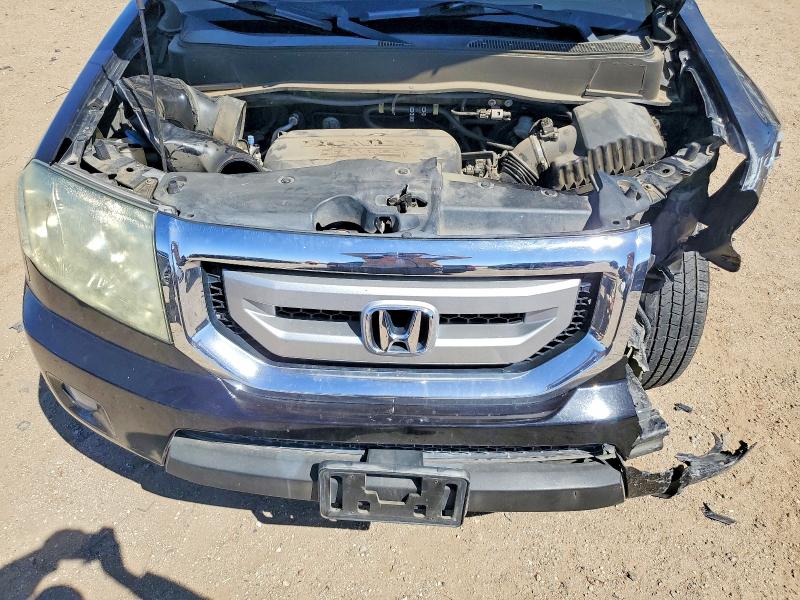 Снимка 11 от търг – 2011 HONDA PILOT с VIN 5FNYF4H98BB086268