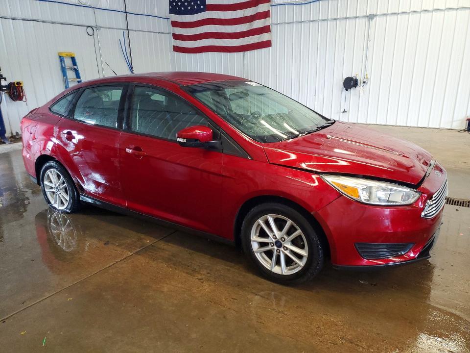 Снимка 4 от търг – 2015 FORD FOCUS с VIN 1FADP3F27FL373539