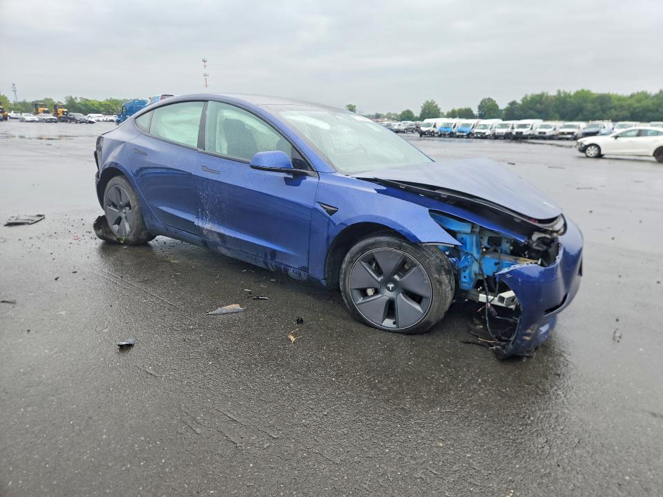 Снимка 4 от търг – 2023 TESLA MODEL 3 с VIN 5YJ3E1EB8PF621609